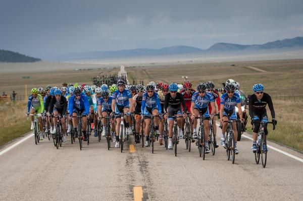 Garmin-Sharp and UnitedHealthcare mass at the front in the wide-open terrain prevalent for much of stage five.