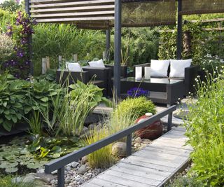 Pergola, seating area, hedging