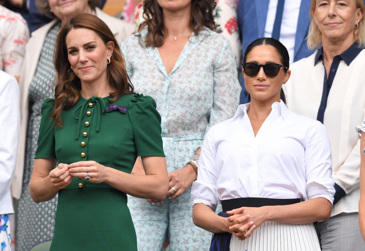 Catherine, Duchess of Cambridge and Meghan, Duchess of Sussex in the Royal Box on Centre Court