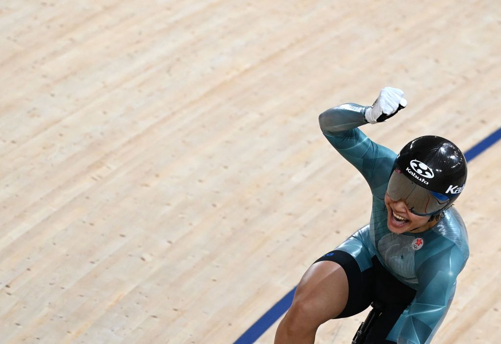Hong Kongs Lee Wai Sze celebrates after taking bronze in the womens track cycling sprint finals during the Tokyo 2020 Olympic Games at Izu Velodrome in Izu Japan on August 8 2021 Photo by Greg Baker AFP Photo by GREG BAKERAFP via Getty Images