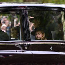 Catherine, Princess of Wales, Princess Charlotte of Wales and Prince George of Wales arrive at Westminster Abbey for The State Funeral of Queen Elizabeth II on September 19, 2022 in London, England. 