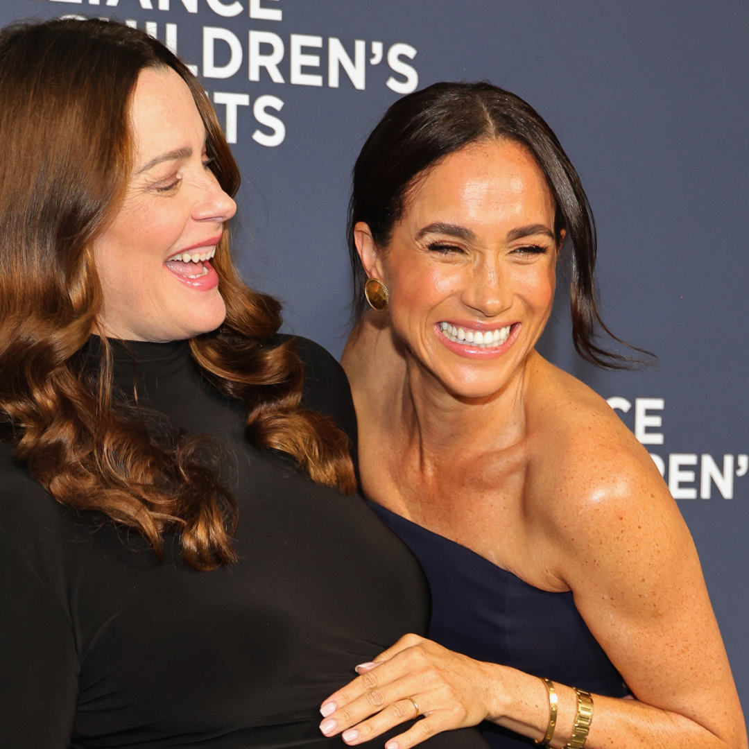 Meghan Markle wears a Ralph Lauren strapless gown