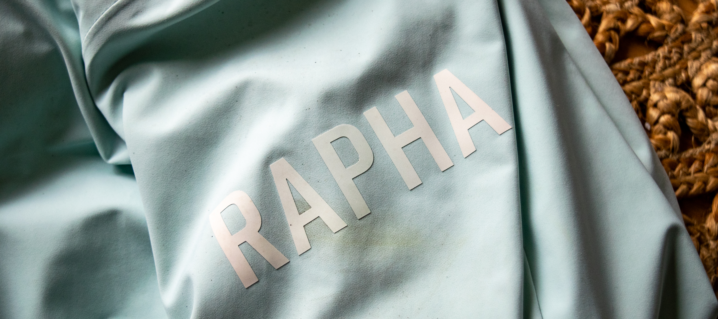 A man wearing a Rapha Shadow jersey