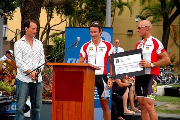 Pete Forbes hands a cheque to Simon Gillett