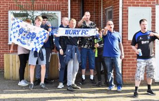 Bury fans gather at Gigg Lane