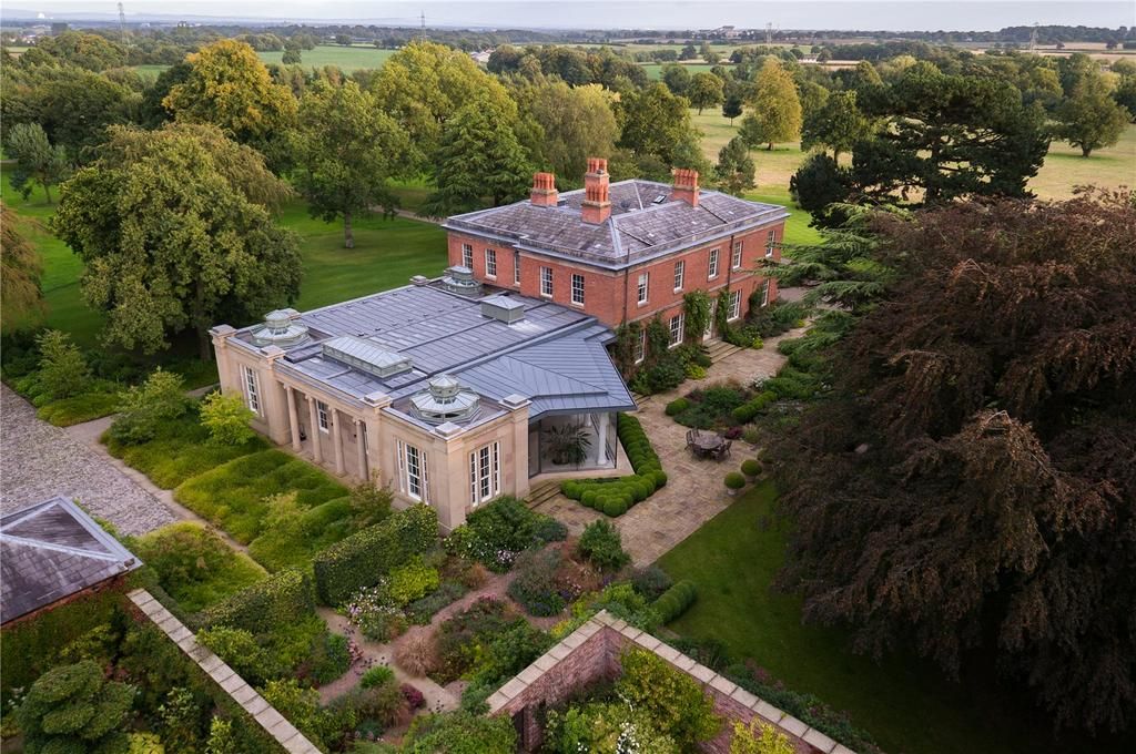 A sprawling estate that includes not one but two magnificent country ...