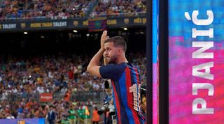 Miralem Pjanic applauds Barcelona fans in the Gamper Trophy game against Pumas in August 2022.