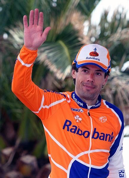 The Spaniard waves to the crowd as he steps onto the podium.