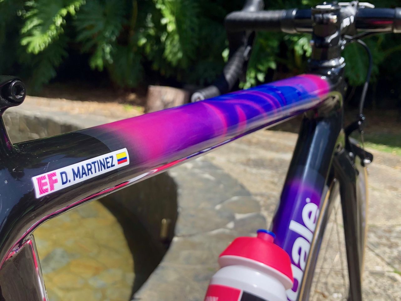 The 'oil stain' design is a printed wrap, which is then clear lacquered for a smooth finish