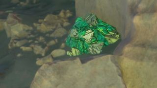 A large lump of Subnautica 2 Troilite sits on the seabed