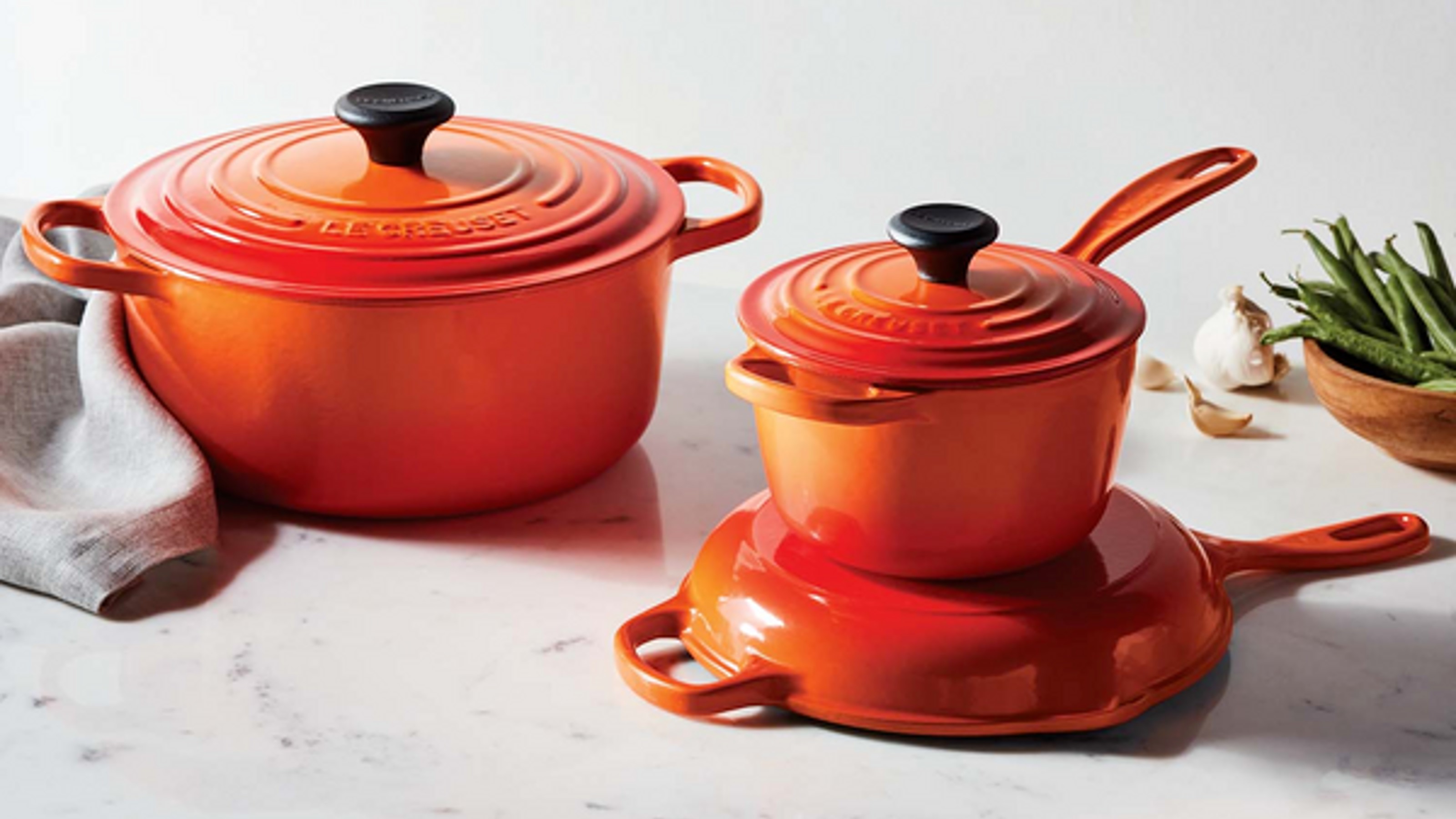 Le Creuset kitchenware in orange
