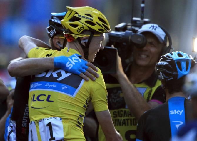 Team Sky celebrate their second consecutive victory in the Tour de France