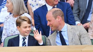 Prince George and Prince William attend The Wimbledon Men's Singles Final the All England Lawn Tennis and Croquet Club on July 10, 2022 in London, England