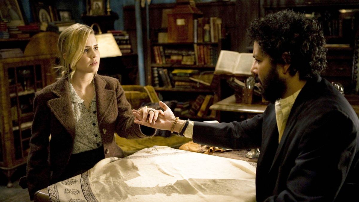 (L-R) Alison Lohman as Christine Brown and Dileep Rao as Rham Jas in &quot;Drag Me to Hell&quot;