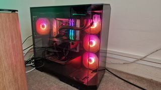 Maingear Zero Ruby review image showing red lighting from within the PC case