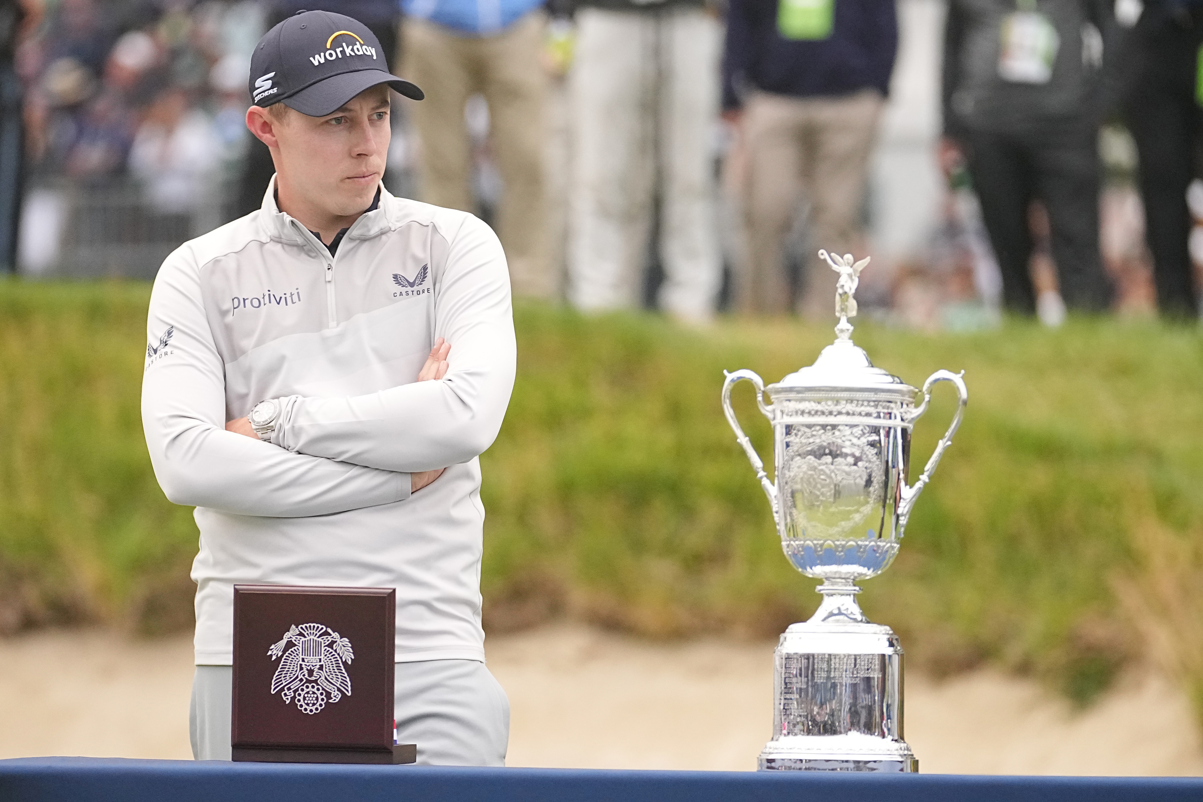 Matt Fitzpatrick stands by the US Open trophy