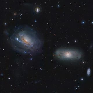 The galaxies NGC 3166 and NCG 3169 in this image by amateur astronomer Igor Cekalin, of Russia, who won the European Southern Observatory's Hidden Treasures 2010 astrophotography contest. This image won second place.
