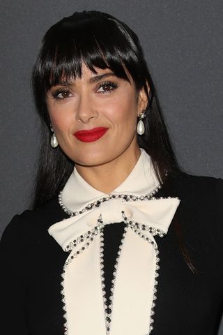 Salma Hayek has a full, wispy fringe as she attends Kering Talks Women In Motion At The 70th Cannes Film Festival at Hotel Majestic on May 23, 2017 in Cannes, France.