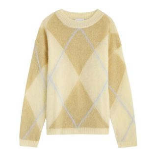 flat lay image of a cream and tan jumper