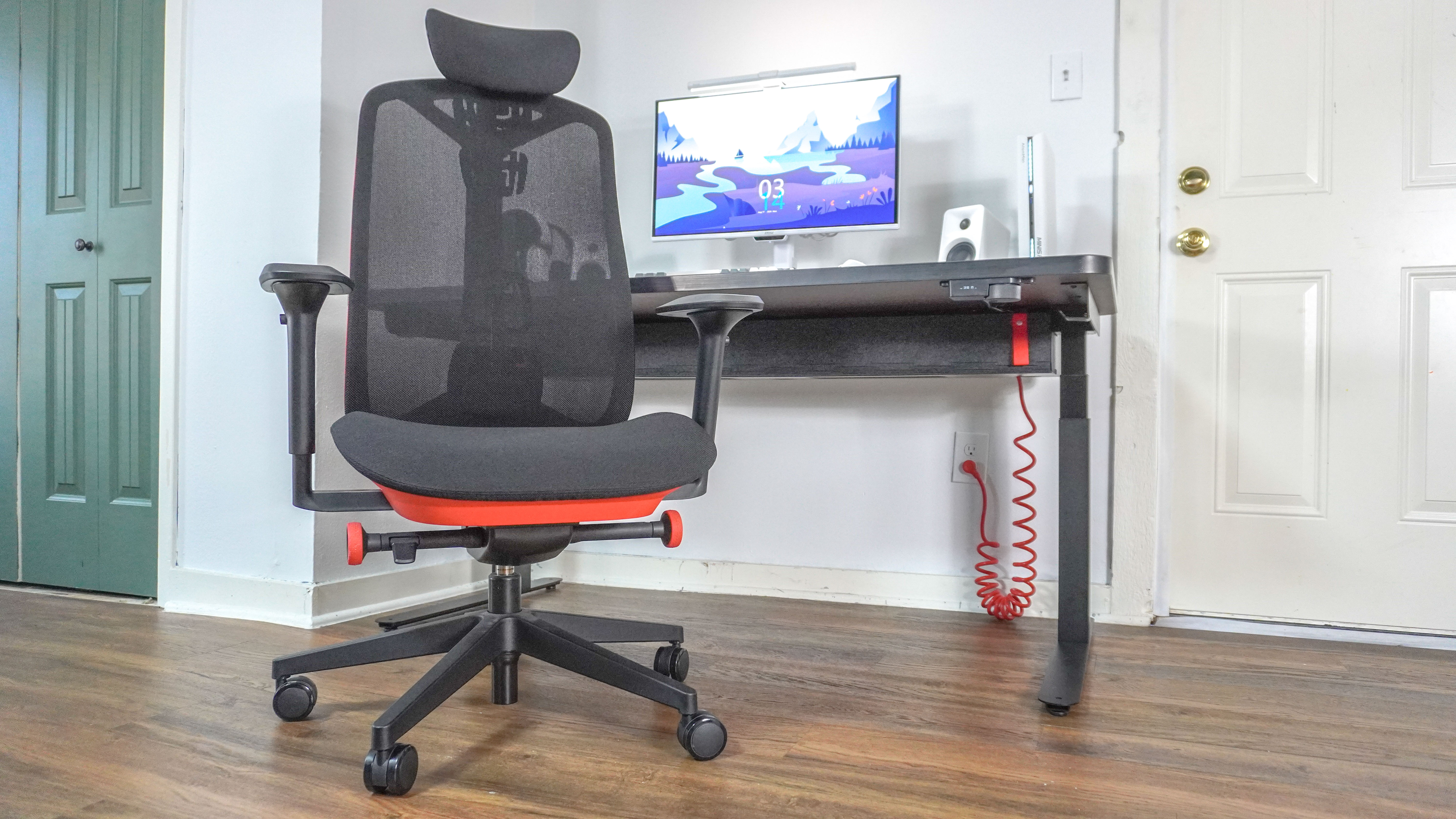 The Herman Miller Vantum gaming chair in front of the Herman Miller Coyl Gaming Desk