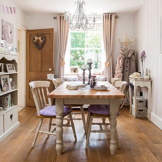 dining room with wooden floor and dining table