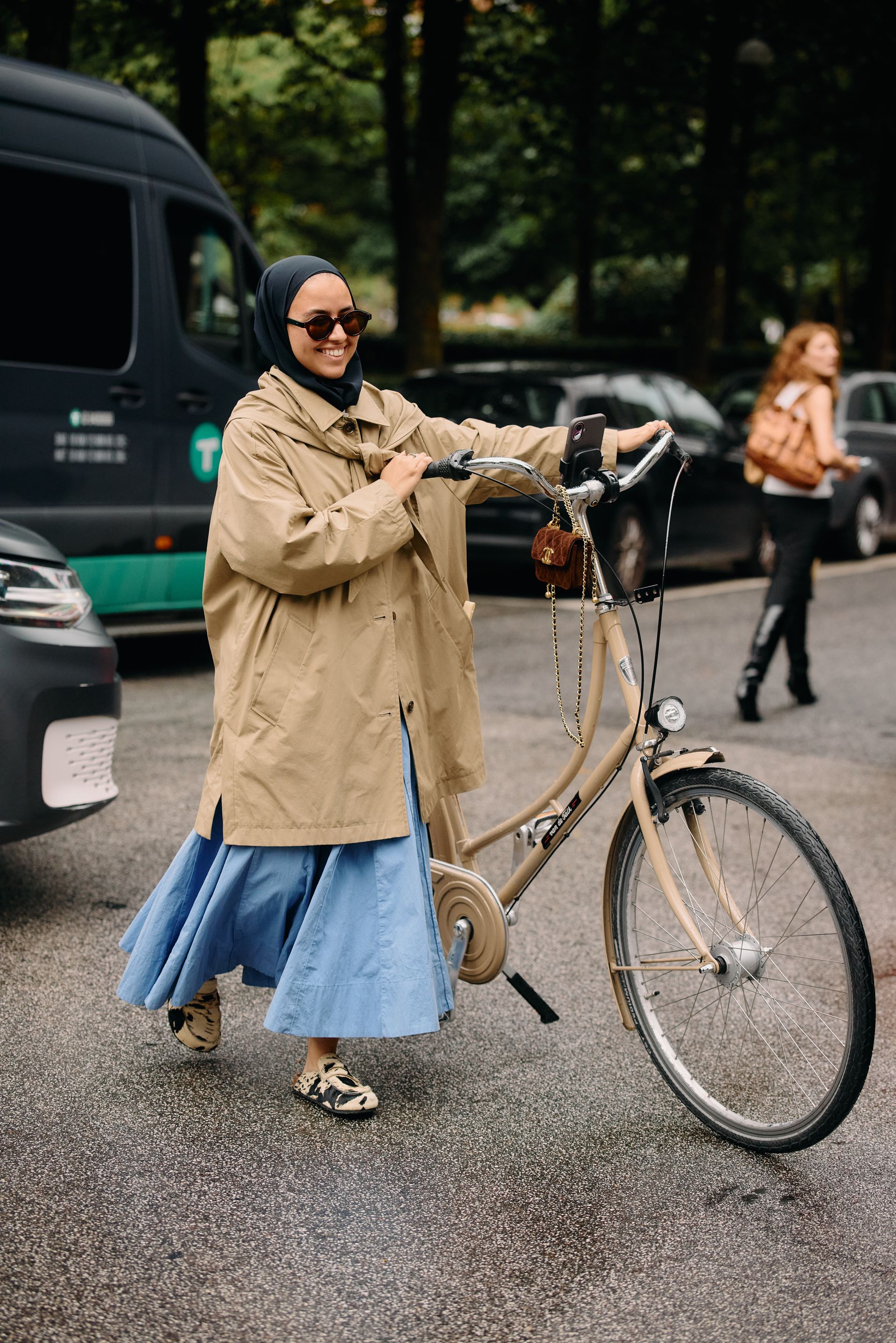 Copenhagen Fashion Week attendees wear animal print shoes.