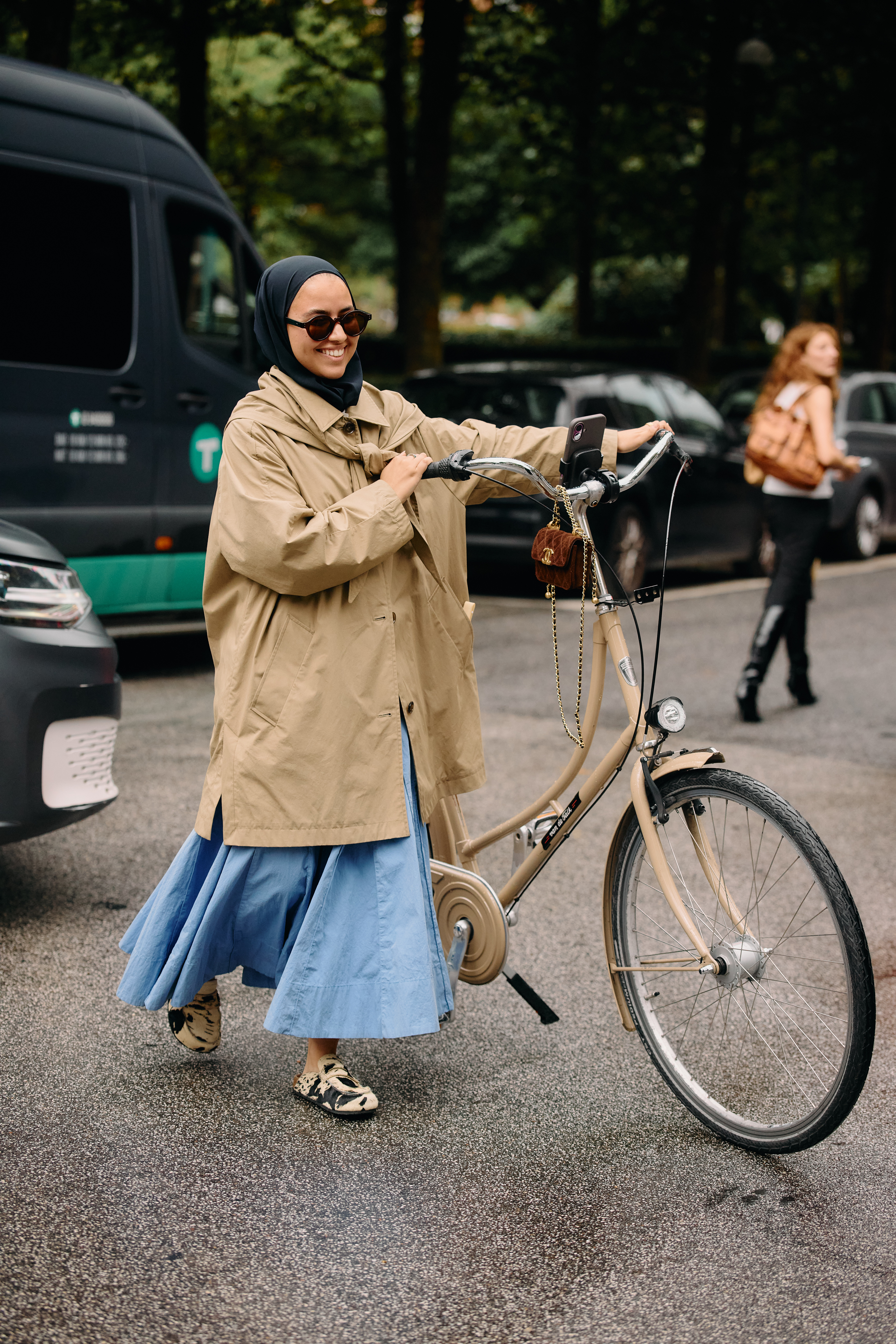 Copenhagen Fashion Week attendees wear animal print shoes.