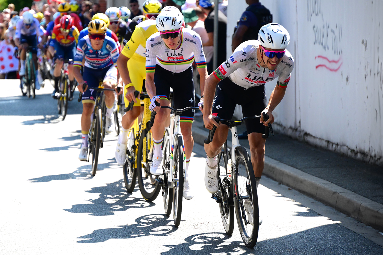 ROUEN, FRANCE - JULY 08: (L-R) Mathieu van der Poel of Netherlands and Team Alpecin - Deceuninck - Yellow Leader Jersey, Tadej Pogacar of Slovenia and Joao Almeida of Portugal and UAE Team Emirates - XRG attack during the 112th Tour de France, Stage 4 a 174.2km stage from Amiens Metropole to Rouen / #UCIWT / on July 08, 2025 in Rouen, France. (Photo by Bernard Papon - Pool/Getty Images)