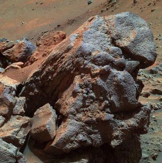 Spirit Rover Traces Mars' Explosive Past, Opportunity Slowly Digs Out