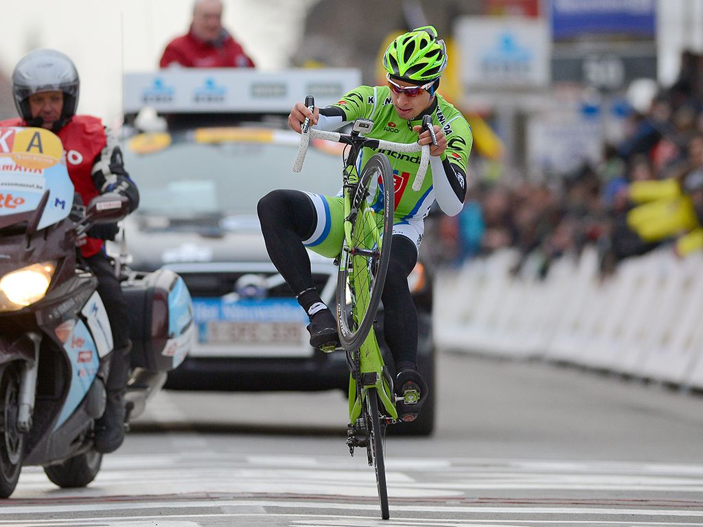 Sagan celebrates in style as he crosses the finish line at Gent-Wevelgem 2013