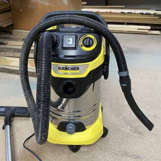 Kärcher WD 6 P Premium Wet and Dry Vacuum Cleaner on dusty workshop floor