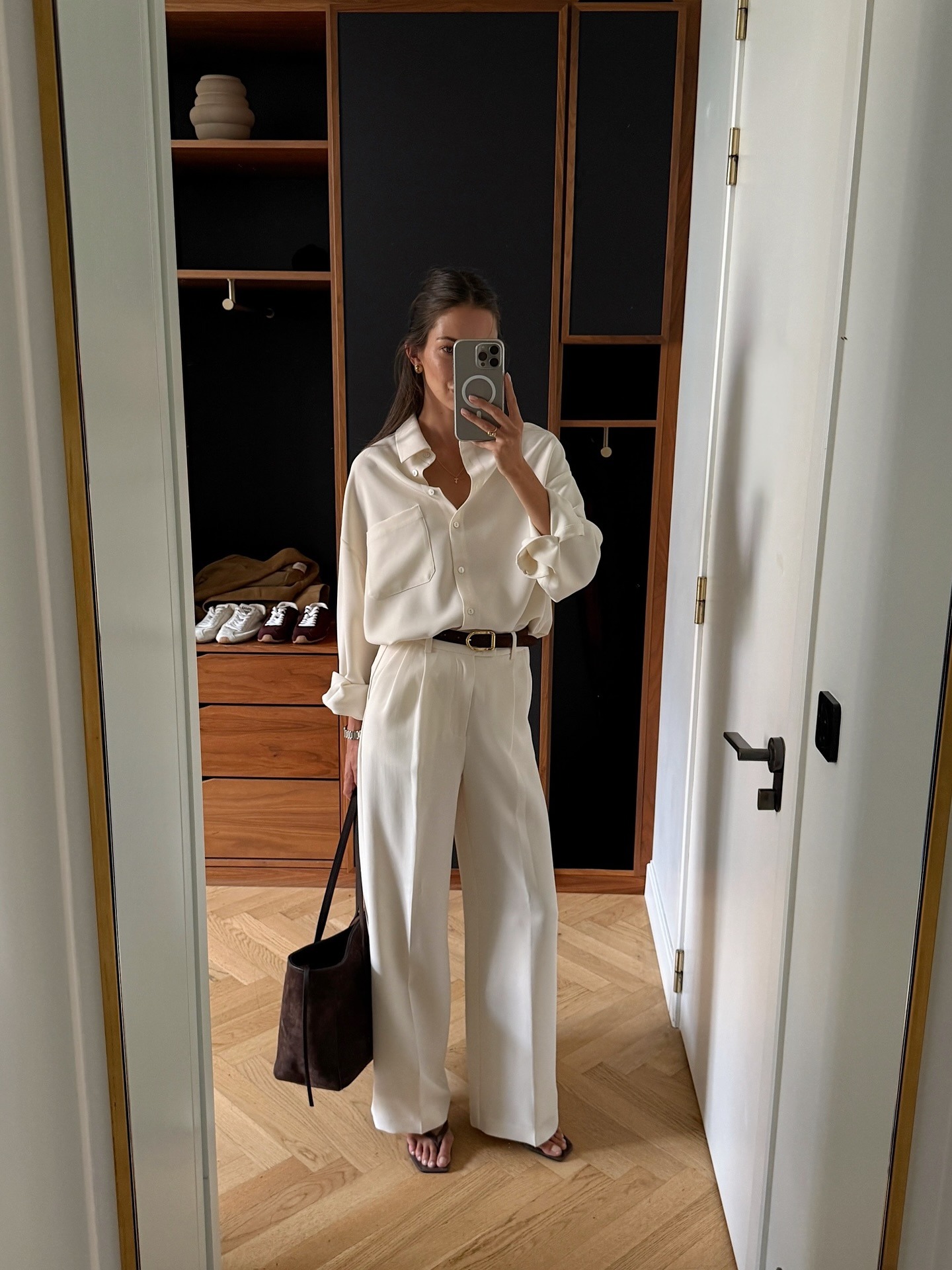 @fakerstrom in a white button-down and trousers