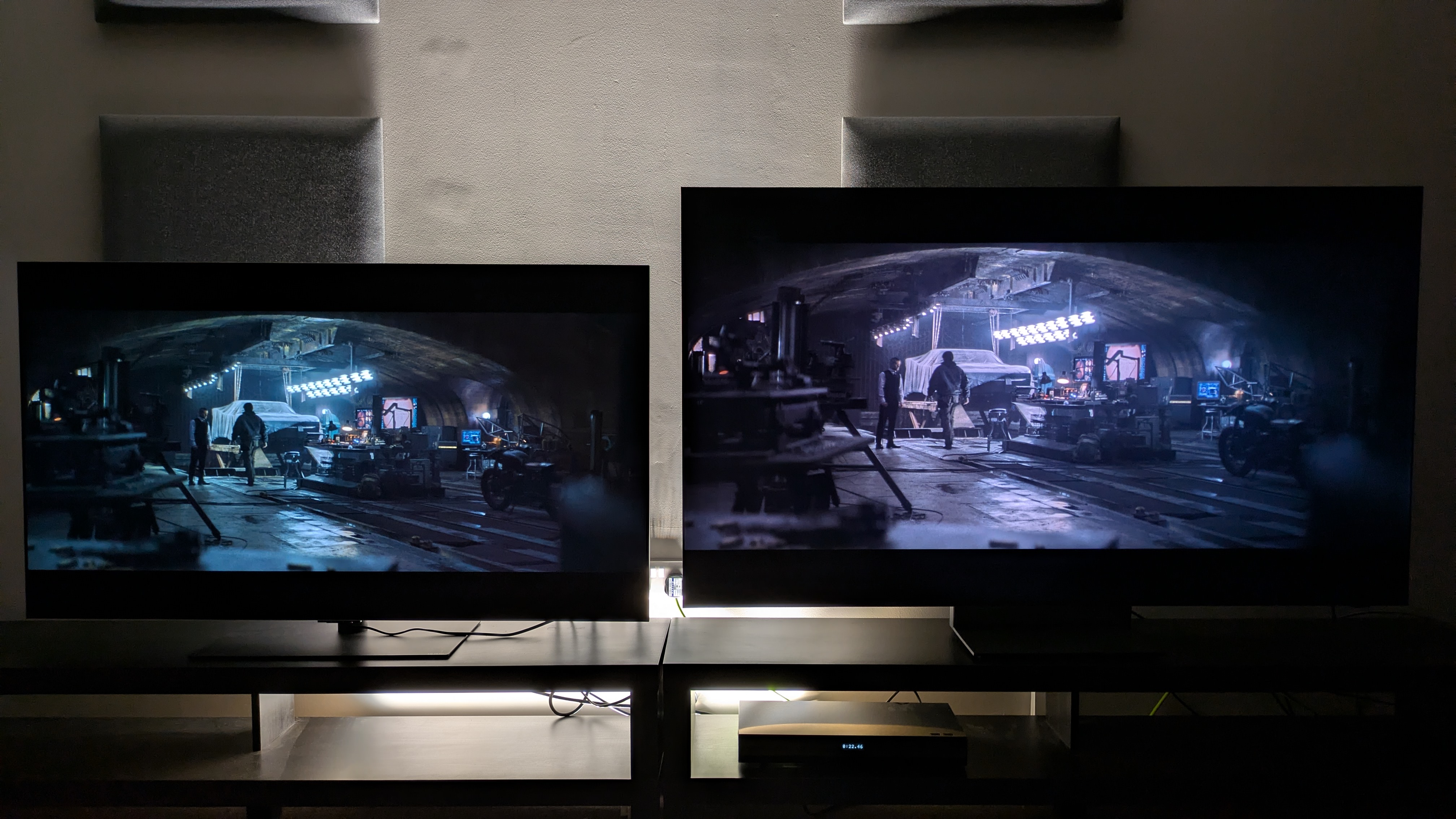LG G6 (left) vs Samsung R95H (right) showing the Batcave from The Batman on screen. Both TVs show excellent contrast between light and dark tones