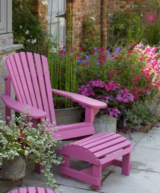 pink painted furniture on a cottage patio