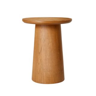 A round wooden pedestal accent table