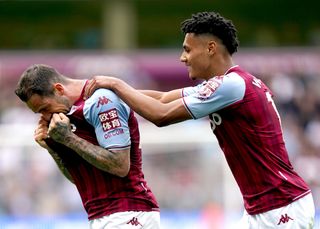 Aston Villa’s Danny Ings (left) celebrates with team-mate Ollie Watkins after scoring their side’s second goal of the game during the Premier League match at Villa Park, Birmingham. Picture date: Saturday April 30, 2022