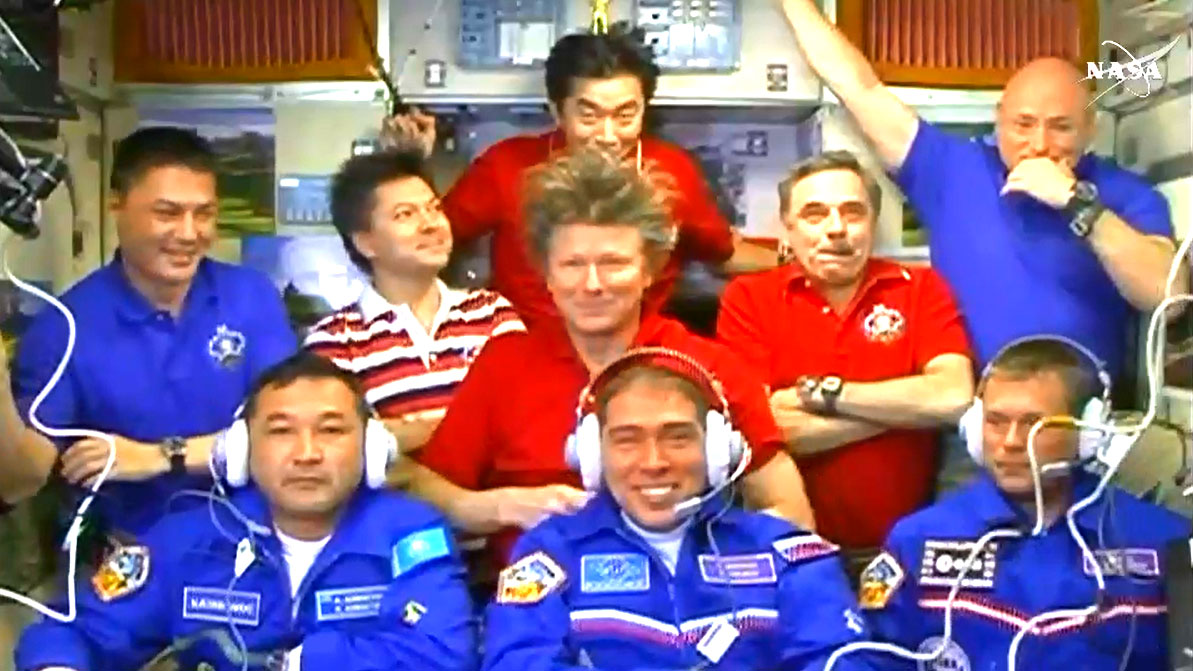 Nine Crewmembers Aboard the Space Station