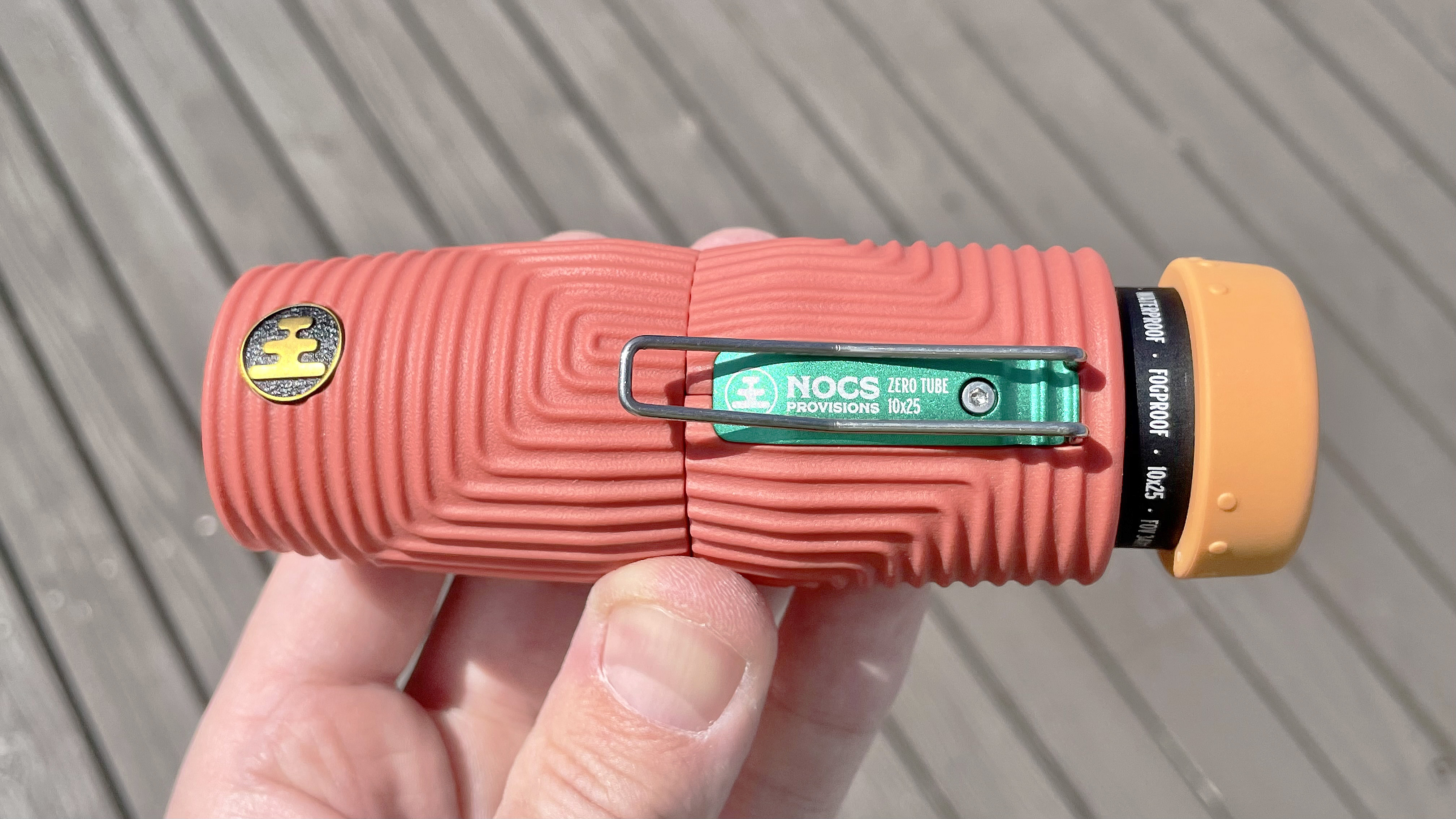 Nocs Tube Zero monocular in bright orange