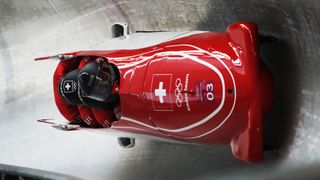 Swiss Bobsleigh driven by Clemens Bracher is seen during their final run in the Men's 4-