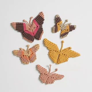 Crochet butterflies on wall