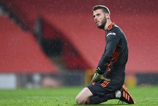 Manchester United goalkeeper David de Gea appears dejected after they concede a second goal during the Premier League match at Old Trafford, Manchester.