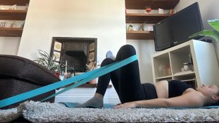 Alice Porter performing hip stretches