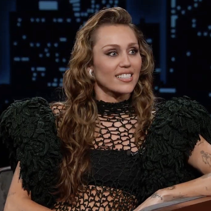 miley cyrus wears a net ala&iuml;a dress on Jimmy Kimmel Live!