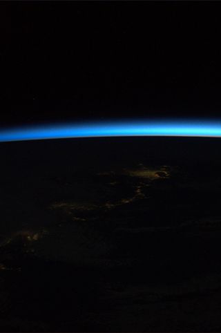 This space sunrise photo shows Taiwan and the Philippines as they appeared to NASA astronaut Ron Garan on April 19, 2011, from a window on the International Space Station during the Expedition 27 flight.