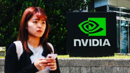 TAIPEI, TAIWAN - APRIL 16: The logo of NVIDIA, an American tech company which designs and supplies GPUs, APIs, and Artificial Intelligence (AI) software and hardware, in Taipei, Taiwan, on April 16, 2025. The United States President Donald Trump's administration has confirmed that tariffs on semiconductors and some other technology products will 'take place in the very near future'. With tariffs and export restrictions expected to be implemented by the American government, electronic products such as iPhone, smartphones, tablet, computer and other digital devices requiring advanced microchips, as well as such global supply chain are likely to be affected. (Photo by Daniel Ceng/Anadolu via Getty Images)