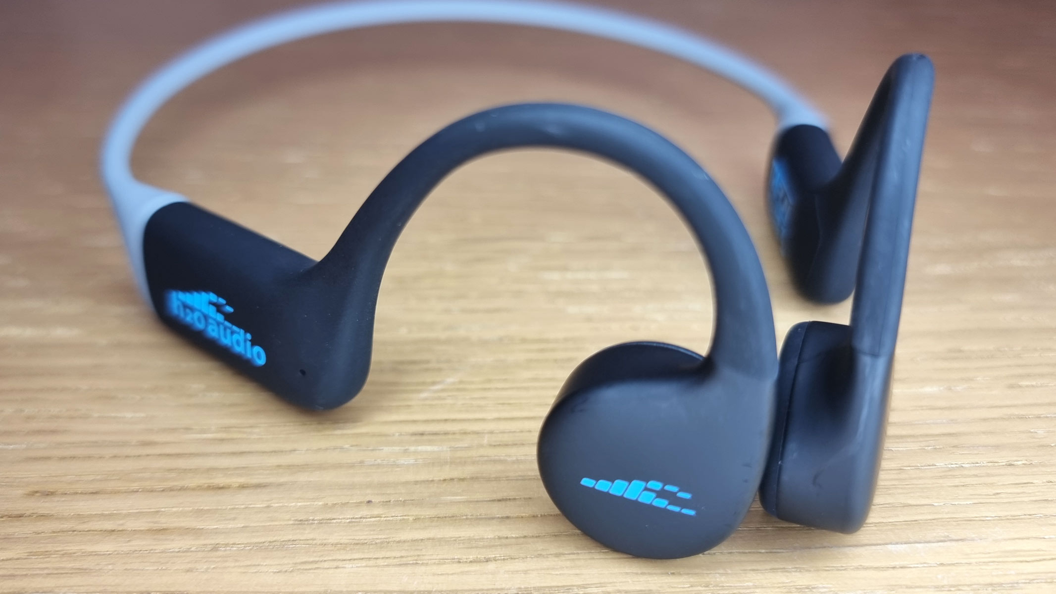 a close-up picture of the H20 Audio Tri Run headphones