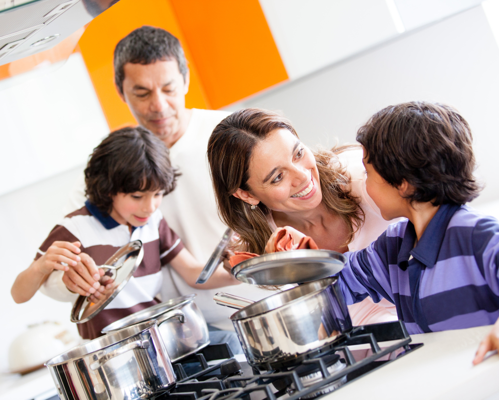 A Latino family cooking together