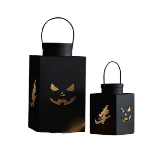 Black metal lanterns with Halloween cutouts