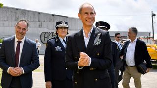 Prince Edward greets emergency services volunteers after arriving for an official visit to the New South Wales State Emergency Services in Sydney on November 23, 2023