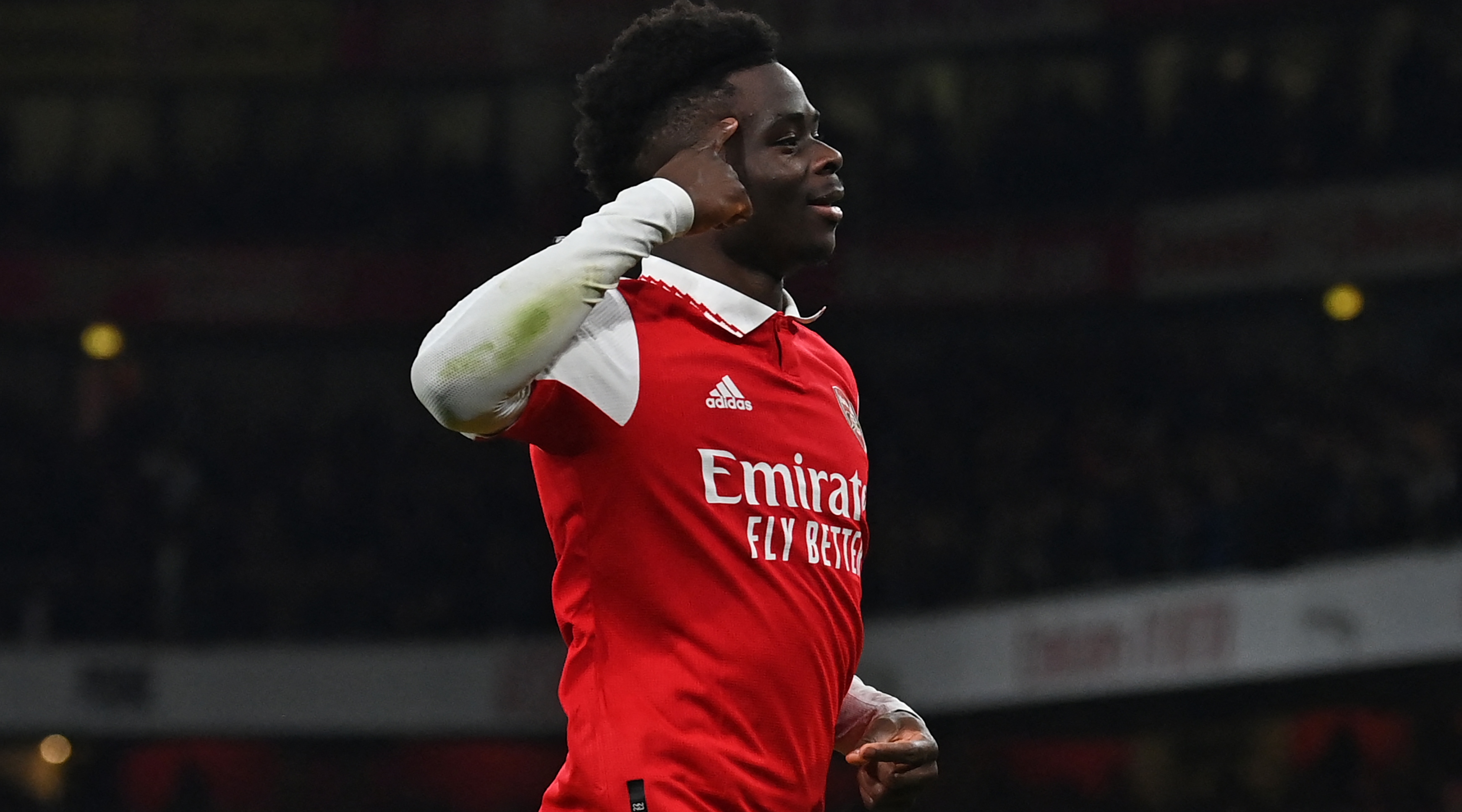 Bukayo Saka of Arsenal celebrates after scoring his team's second goal during the Premier League match between Arsenal and Manchester United on 22 January, 2023 at the Emirates Stadium in London, United Kingdom.